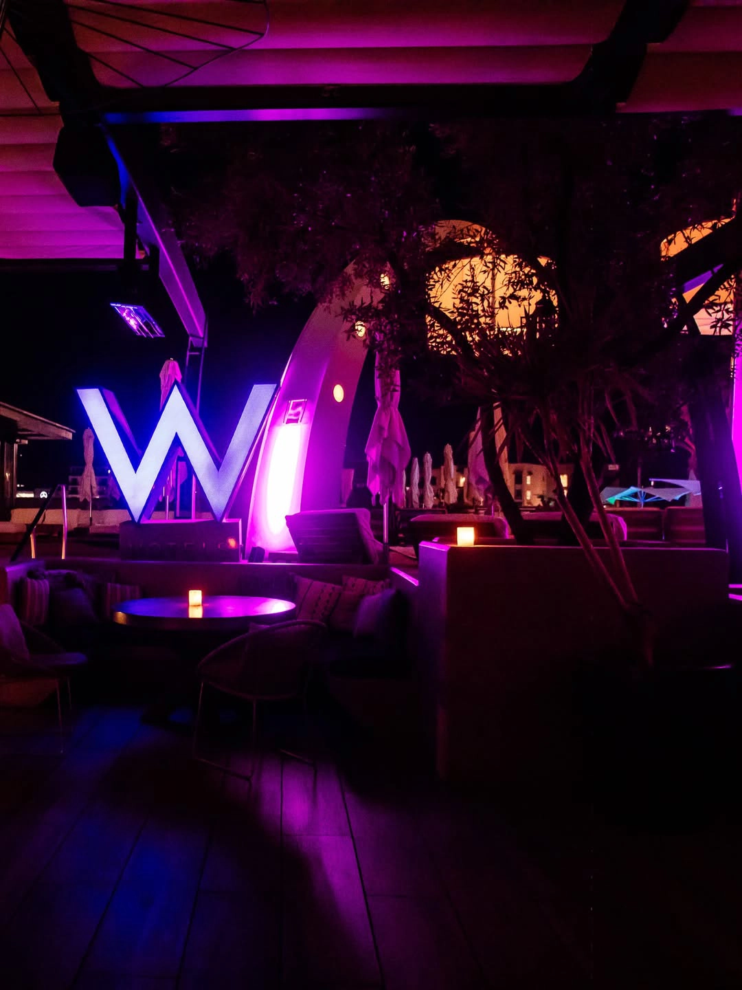 Cottontail Lounge lit up after dark